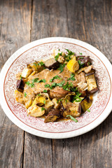 Pork steak with leeks and aubergine