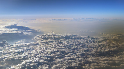 Fototapeta premium Flying in the sky over the clouds.