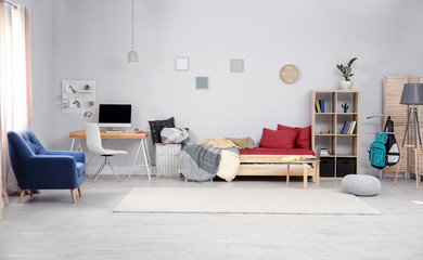Modern child room interior with comfortable bed