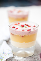 Panna cotta in layers with vanilla and strawberries