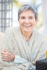 Fototapeta na wymiar Portrait of a mature elderly woman smiling.