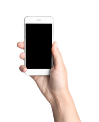 Young woman holding mobile phone with blank screen in hand on white background