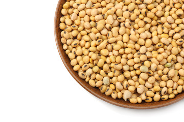 Soybeans in bowl isolated on white background. top view