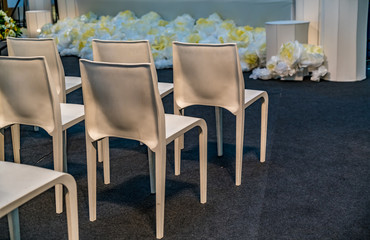 Fototapeta na wymiar White plastic chairs