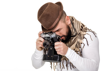 photographer with retro camera takes photos