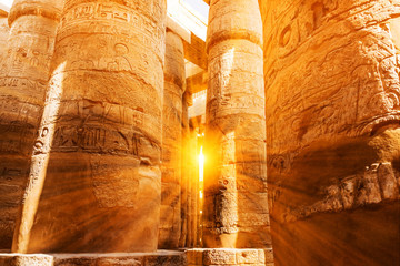 A sandstone column in Egypt.  columns covered in hieroglyphics