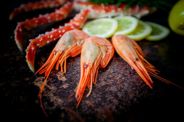 Crab legs on  rustic background