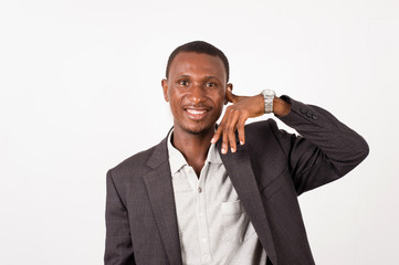 Young Businessman showing "Call me" sign