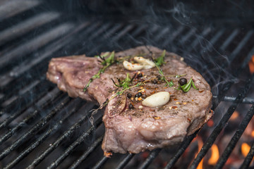 Raw Marbled Meat of Club Steak on Grill