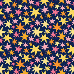 Colorful vector seamless pattern with yellow, orange and pink stars on dark background for baby and kid designs