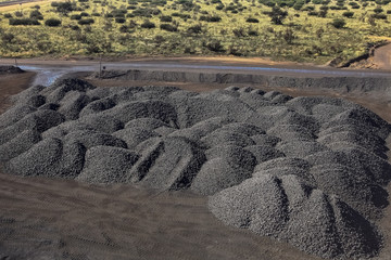 Large piles of processed Manganese rich ore rock