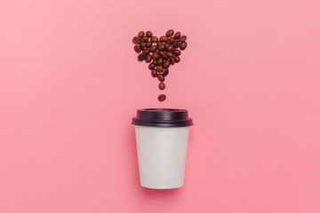 take away coffee cup on colorful paper background