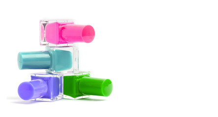 Colorful nail polishes bottles, manicure concept