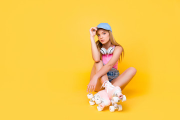 Street urban outdoor style lifestyle concept, portrait with copyspace of dreamy cool girl with...