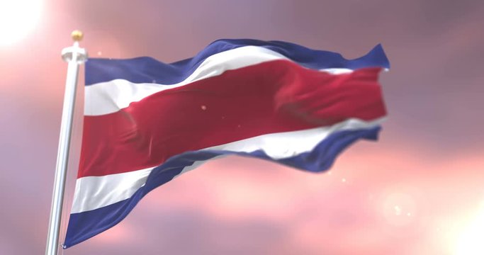 Costa Rica flag waving at wind at sunset, loop