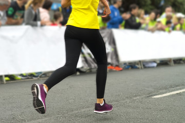 Fototapeta premium athletics runners competitors in city race in motion blur