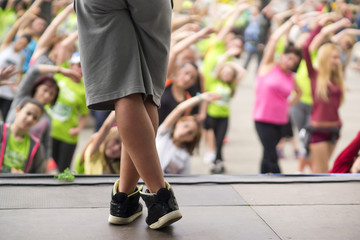 dancing zumba aerodance sh'bam in fitness class in city street