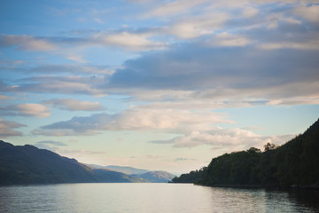 Blue lake among tranquil woods to relax with calm on vacation