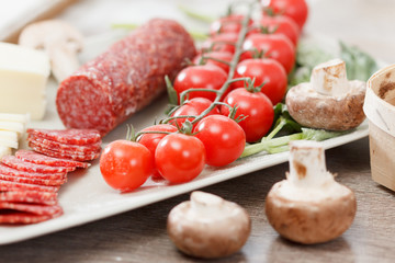 Food ingredients for pizza on table