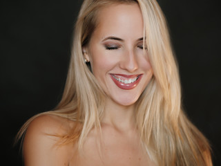 Portrait of beautiful sensual woman with green eyes. Studio shot.