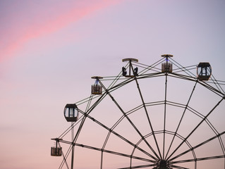 Ferris wheel at sky background right side composition