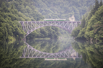 Fototapeta premium Tadami railway line and Tadami River in summer season at Fukushima prefecture.