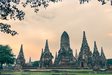 Fototapeta premium Wat Chaiwatthanaram, Buddhist temple, Ayutthaya Historical Park, Thailand, at sunset