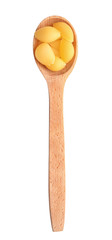Wooden spoon with raw pasta on white background