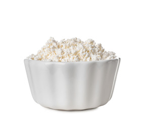 Bowl with tasty cottage cheese on white background