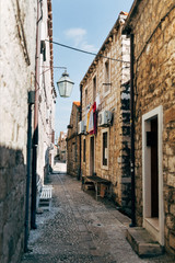 Fototapeta na wymiar scenic view of empty narrow street in Dubrovnik, Croatia