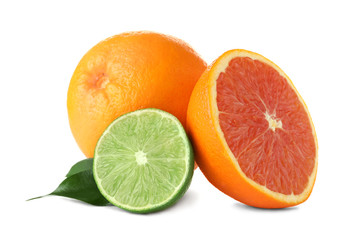 Ripe citrus fruits on white background