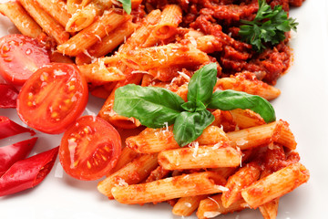 Tasty pasta with tomato sauce, closeup