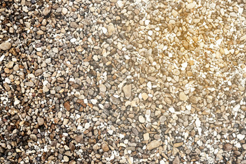 Abstract texture of white-gray gravel and crushed stone