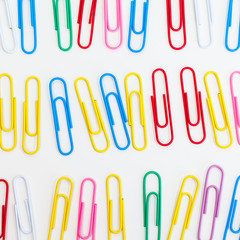Metal paper clip isolated on a white background