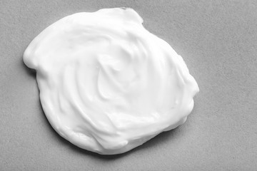 Sample of cream on gray background. Skin care cosmetics