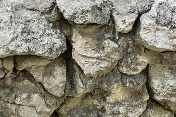 masonry stone wall of large stone limestone