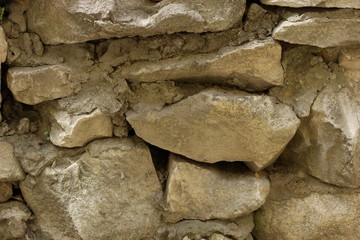 masonry stone wall of large stone limestone