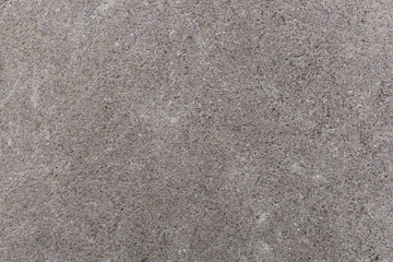 surface of the brown stone texture background.