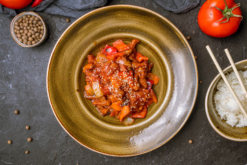 Fried pork with vegetables in Thai sauce