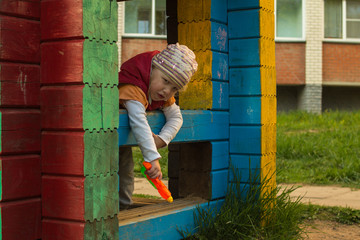 small children play on the playground