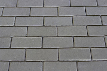 Gray brickwork close-up top view texture, background