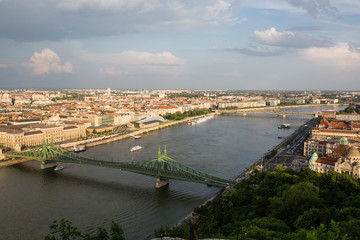 Fototapeta premium Evening view of Parliament and Pest city. Splendid spring cityscape of Budapest
