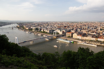 Obraz premium Evening view of Parliament and Pest city. Splendid spring cityscape of Budapest