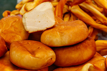 Different kinds of smoked cheese on a table
