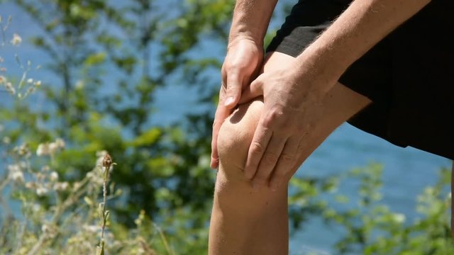 Pain in the knee. Problems with joints. 