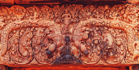 Banteay Srei - unique temple of pink sandstone. Thread fragments.