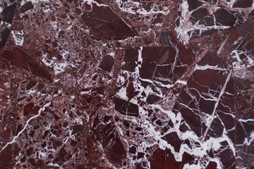 The red marble. Texture.