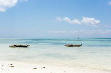 Naklejka na ściany i meble Tropical beach at low tide in Jambiani, Zanzibar, Tanzania Africa