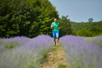 Obraz premium Happy farmer in his lavender field