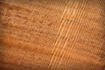 Wooden texture with traces of the saw for background.